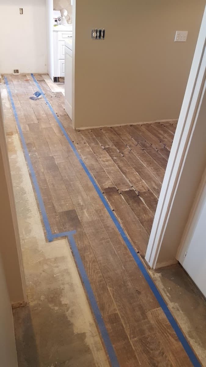 Before: old flooring removed and the slab prepped