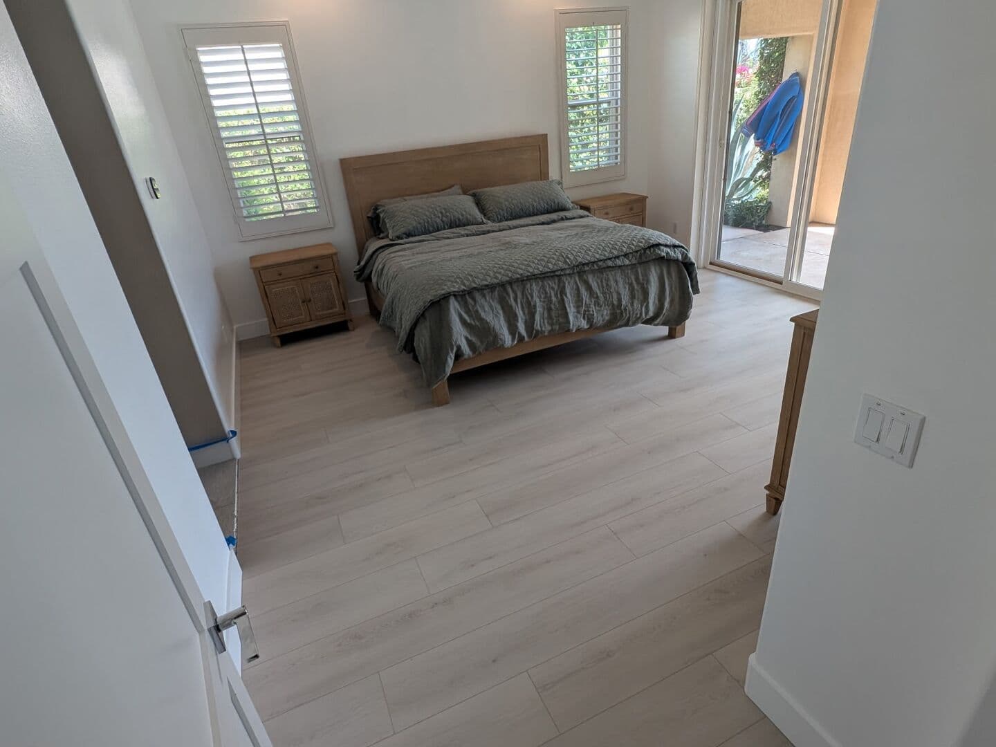 Light wood-look plank flooring in a bedroom
